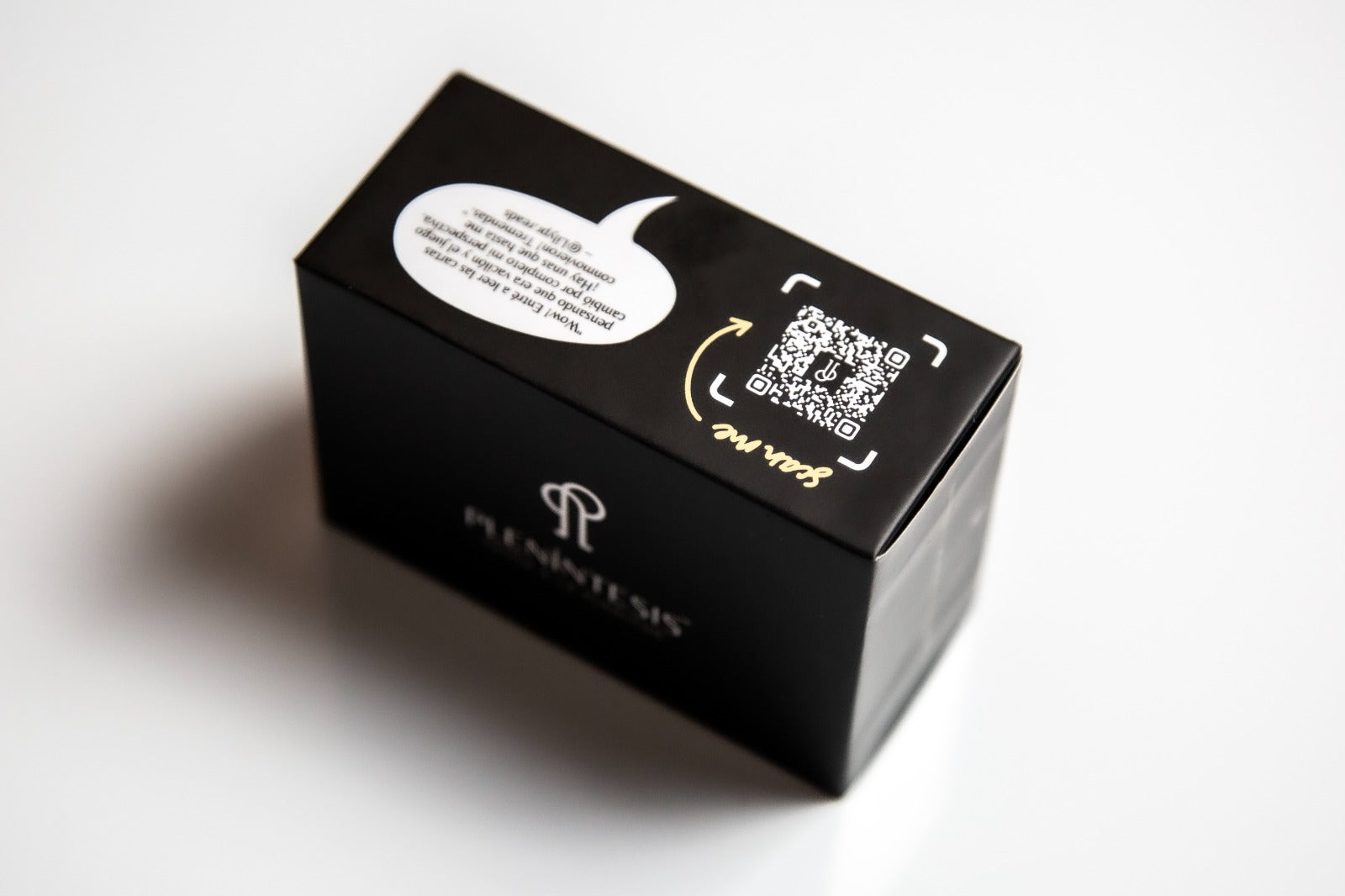 Plenintesis Black box with speech bubble and QR code design on a white background