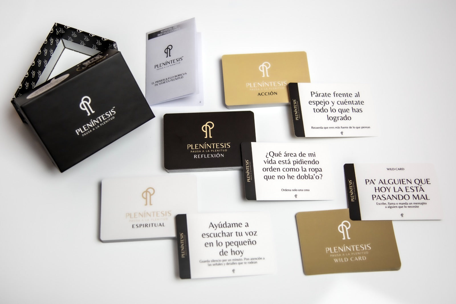 Collection of Plenitéstis products including cards and a box on a white background